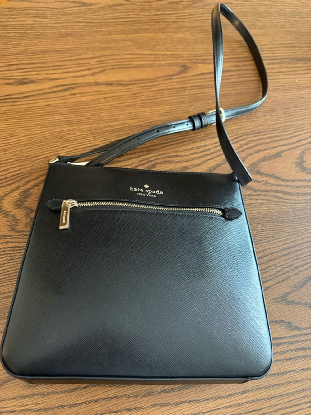 kate Spade black leather Cross Body with gold logo and zipper